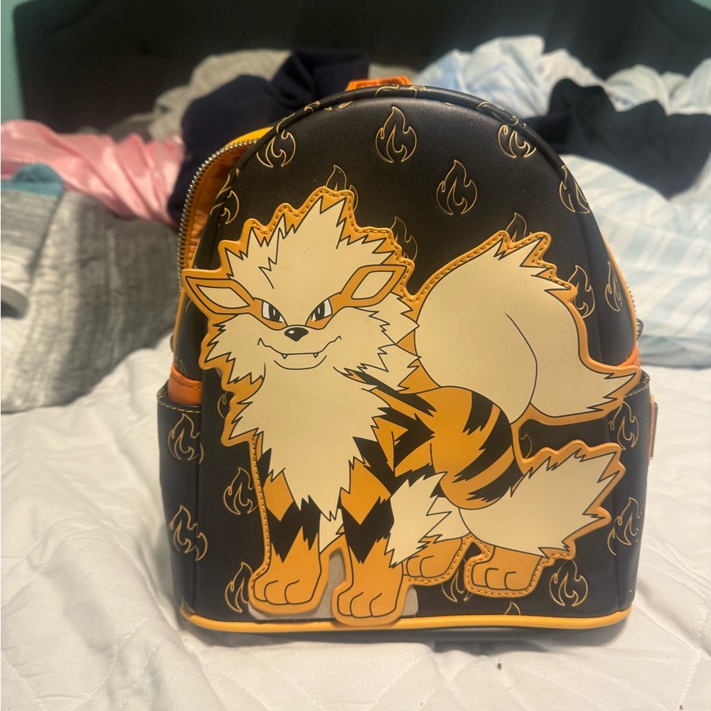 Black and Orange Backpack with Arcanine Design
